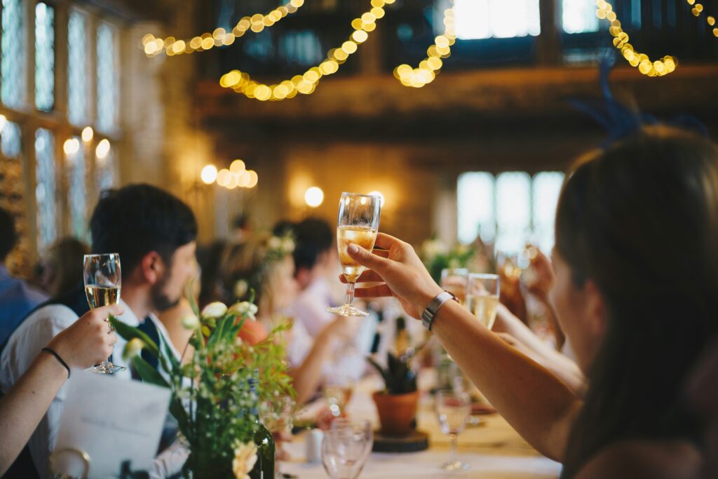 people during a toast during the wedding reception