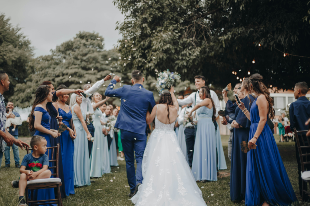 end of ceremony with bridal party in blue