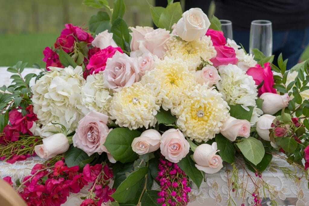 in bloom red, white and pink flowers for a bridal bouquet