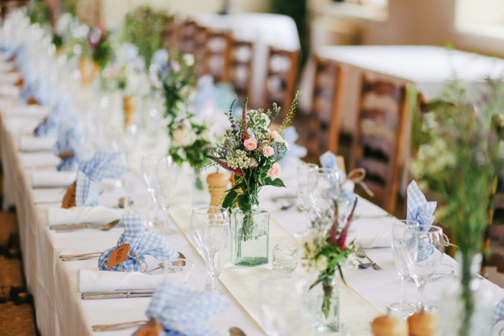 white, blue and green country table setting for a wedding