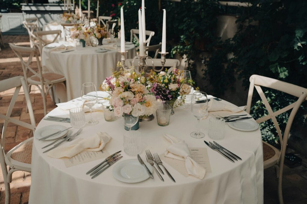 white and pastel wedding table setting